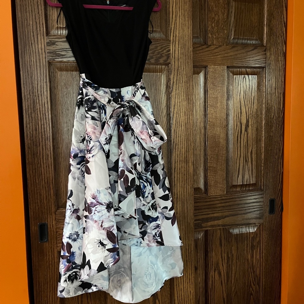 Dress with fitted black top and floral flowy bottom